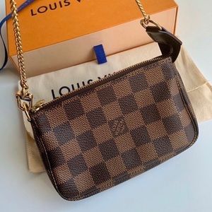 $SOLD$Brand new Louis Vuitton mini pochette